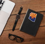 Copper Star AZ Flag Sticker on Journal with Laptop and Watch