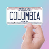 Columbia Missouri License Plate Sticker on Blue Background