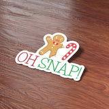 Oh Snap Gingerbread Man Christmas Sticker on Wood Desk in Office