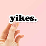 Yikes Typography Sticker in hand