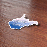 Almost Heaven West Virginia Sticker on Wood Desk