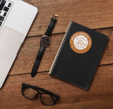 Cute Arches National Park Moab Utah Sticker on Journal with Laptop and Watch on Wood Desk in Office