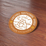 Cute Arches National Park Sticker on Wood Desk in Office