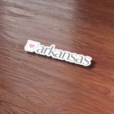 Southern Home Arkansas Sticker on Wood Desk in Office