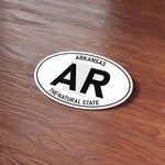 Cute Arkansas Sticker on Wood Desk in Office