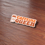 Caffeine Queen Funny Coffee Sticker on Wood Desk in Office