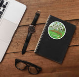 Swamp Alligator Louisiana Sticker on Journal with Laptop and Watch on Wood Desk in Office