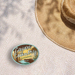 Cute Louisiana Bumper Sticker Outdoors on Beach Blanket