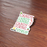 Candy Canes Candy Corns and Syrup Elf Quote Christmas Sticker on Wood Desk