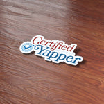 Funny Certified Yapper Meme Sticker on Wood Desk in Office