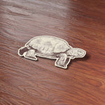 Cute Desert Wildlife Tortoise Sticker on Wood Desk in Office