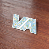 Cute Dogwood VA State Flower Virginia Bumper Sticker on Wood Desk in Office