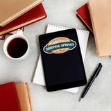 Dripping Springs Texas Hill Country Sticker on Kindle Tablet with Coffee Mug