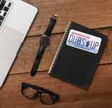 Dubs Up University of Washington Sticker on Journal with Laptop and Watch