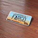 Fargo ND Sticker on Wood Desk in Office