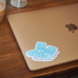 Fuzzy Sock Season Sticker on Macbook