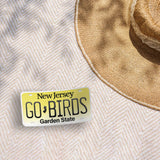 Go Birds New Jersey License Plate Sticker on Beach Blanket