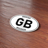 White Oval Green Bay Wisconsin Sticker on Wood Desk in Office