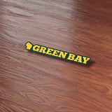 Cute Green Bay Sticker on Wood Desk in Office