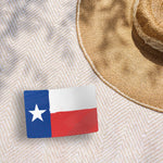 Grungy Texas Flag Sticker on Beach Blanket