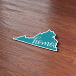 Home Virginia Sticker on Wood Desk in Office