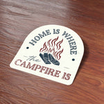 Home is Where the Campfire is Cool Adventure Sticker on Wood Desk in Office