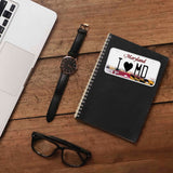 I Love MD License Plate Maryland Sticker on Journal with Macbook and Watch on Wood Desk in OFfice
