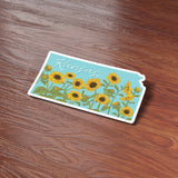 Sunflowers Kansas Sticker on Wood Desk in Office