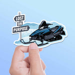 Lost on Purpose Snowmobile Sticker held in hand
