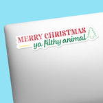 Merry Christmas Ya Filthy Animal Sticker on Laptop