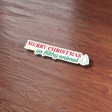 Merry Christmas Ya Filthy Animal Sticker on Wood Desk