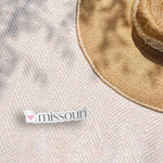 Missouri Heart Bumper Sticker Outdoors on Beach Blanket