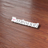 Missouri Heart Bumper Sticker on Wood Desk