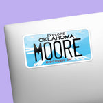 Moore Oklahoma License Plate Decal on Laptop