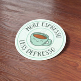 More Espresso Less Depresso Coffee Sticker on Wood Desk in Office