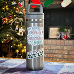Let's Get Lit Christmas Sticker on Water Bottle in Front of Christmas Tree