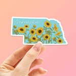 Nebraska Sunflower Bumper Sticker on Pink Background