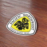 Pacific Northwest Trail Sign Sticker on Wood Desk in Office