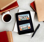 Pine Mountain GA and Ellijay Georgia License Plate on Kindle eReader with Books and Coffee Mug