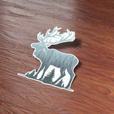 Pine Tree Forest Mountain Elk Sticker on Wood Desk in Office