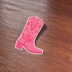 Pink Cowgirl Boot Sticker on Wood Desk in Office