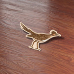 Cute Road Runner Bird Sticker on Wood Desk in Office