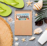 Savannah Georgia Sticker on Notebook with Beach Sunglasses, Flip Flops, and Sea Shells