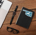 Cute Oklahoma State Bird Sticker on Journal with Laptop and Watch on Wood Desk in Office