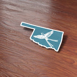 Cute Oklahoma State Bird Sticker on Wood Desk in Office