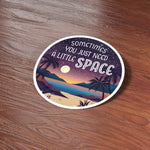 Just Need A Little Space Camping Sticker on Wood Desk