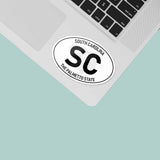 Small SC White Oval South Carolina Sticker on Laptop