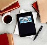 Stillwater Oklahoma Sticker on Kindle eReader with Coffee Mug and Books