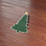 Holiday Sweater Christmas Tree Sticker on Wood Desk in Office