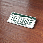 Telluride Colorado Sticker on Wood Desk in Office